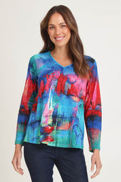 Model Madeline wearing size 10 of the Contemporary V Tee in colour Sailboats (Blue), from the front, cropped image