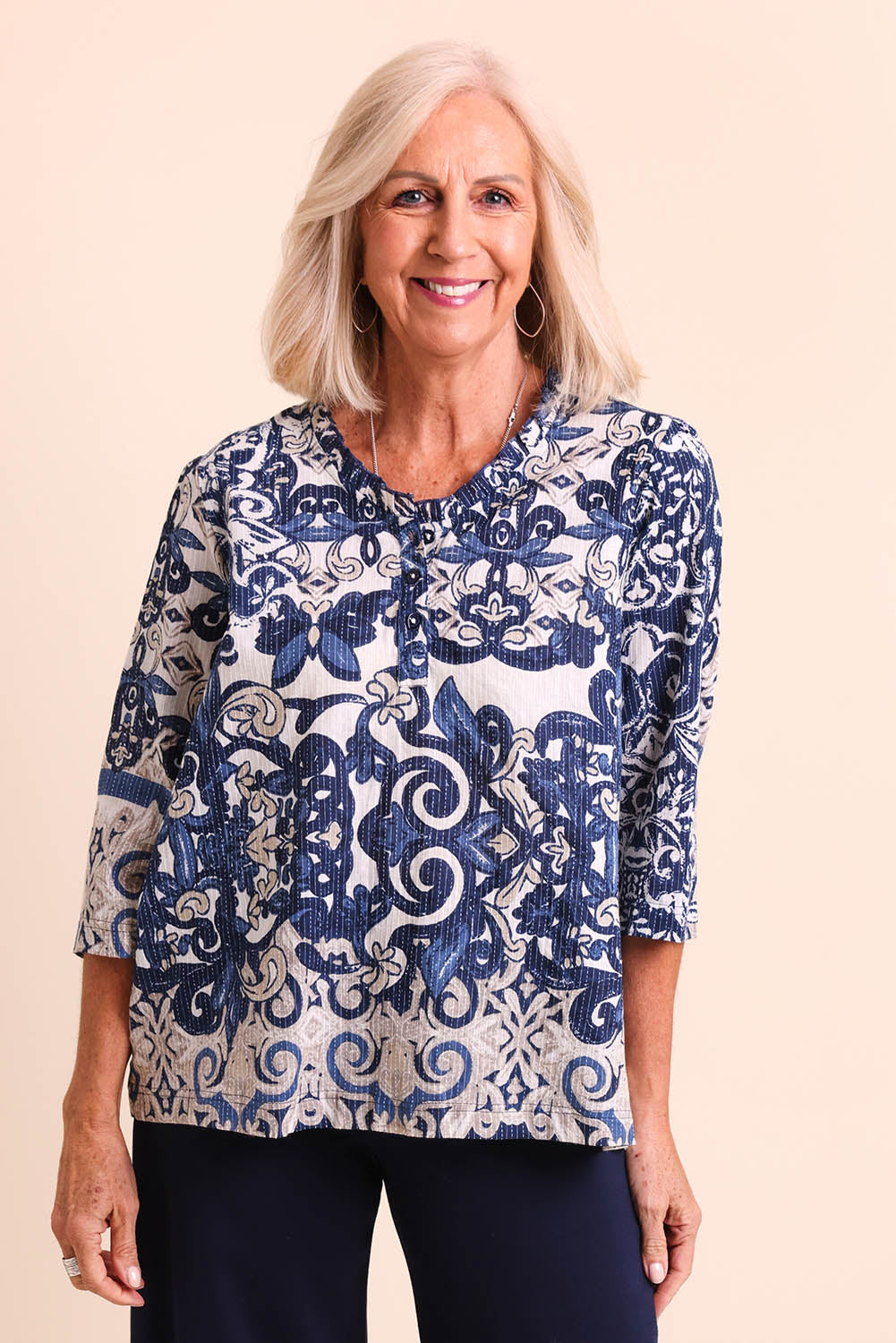 Model Sandys wearing size 10 of the Frill Neckline Cotton Top – Print in colour Print, in a cropped view