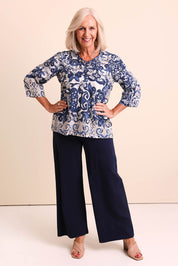 Model Sandys wearing size 10 of the Frill Neckline Cotton Top – Print in colour Print, from the front