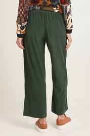 Model Madeline wearing size 10 of the Cord Solids Wide Leg Pant in colour Military (Green), from the back