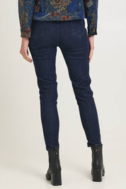 Model Madeline wearing size 10 of the Reversible Jeans in colour Maluku (Blue), from the back