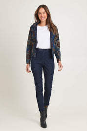 Model Madeline wearing size 10 of the Reversible Jeans in colour Maluku (Blue), from the front, showing the whole outfit