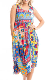 A model wearing the Amritsar Organic Cotton Bubble Sleeveless Dress in colour Print (Blue), from the front, cropped image