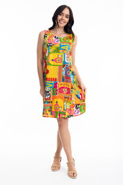 A model wearing the Ocampo Shift Sleeveless Dress in colour Print, from the front, showing the whole outfit