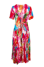 Product shot of the Jozani Godet Short Sleeve Dress in colour Print (Pink), from the back