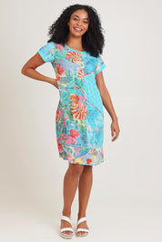 Model Ziara wearing size 10 of the Cotton Patch Dress in colour Malvinas, from the front, showing the whole outfit