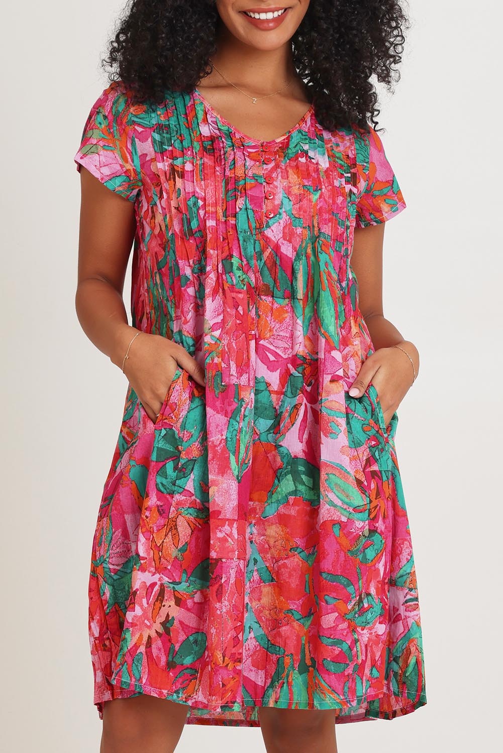Model Ziara wearing size 10 of the Ezy Fit Cotton Dress in colour Saopaulo, from the front, cropped image