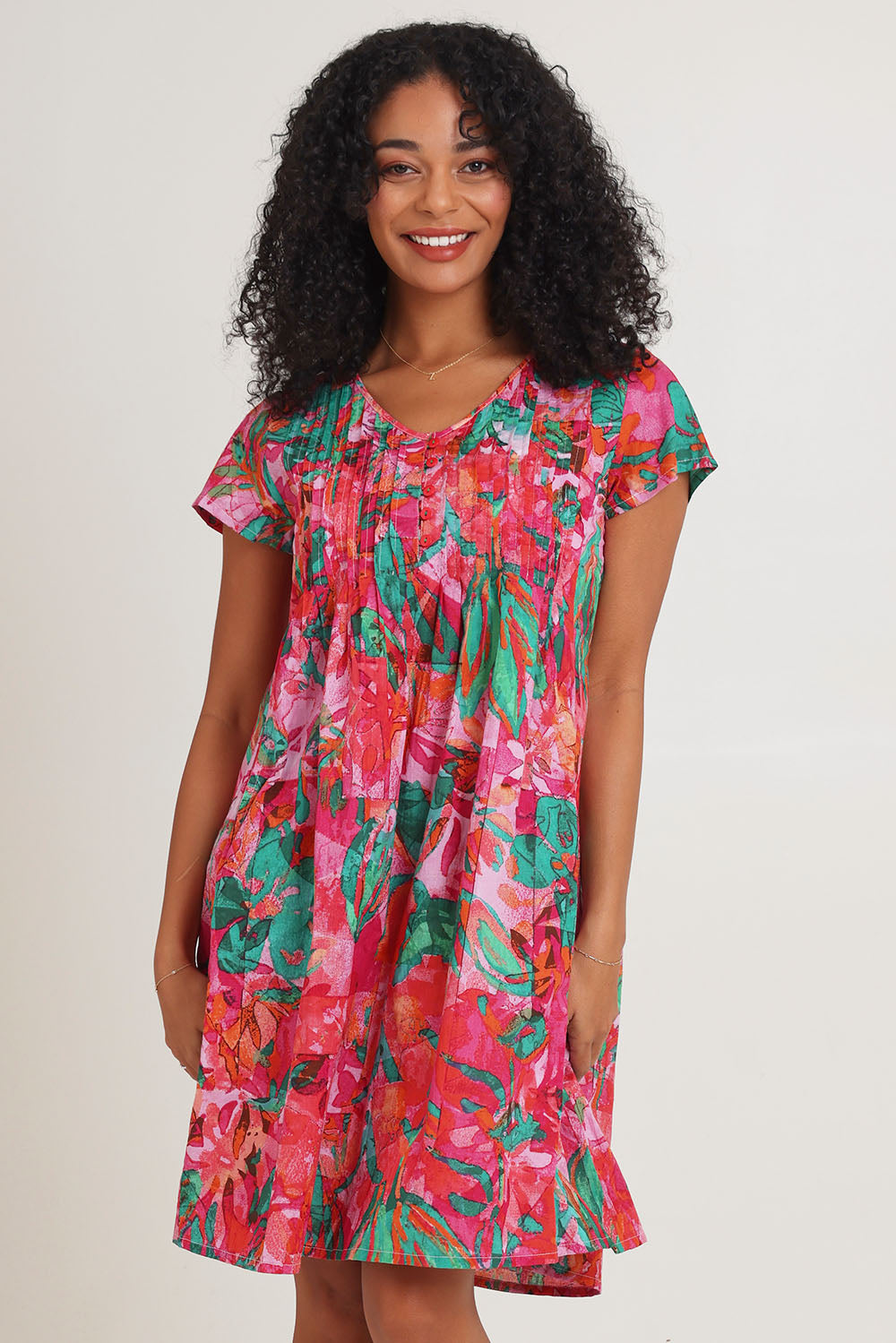 Model Ziara wearing size 10 of the Ezy Fit Cotton Dress in colour Saopaulo, from the front, cropped image