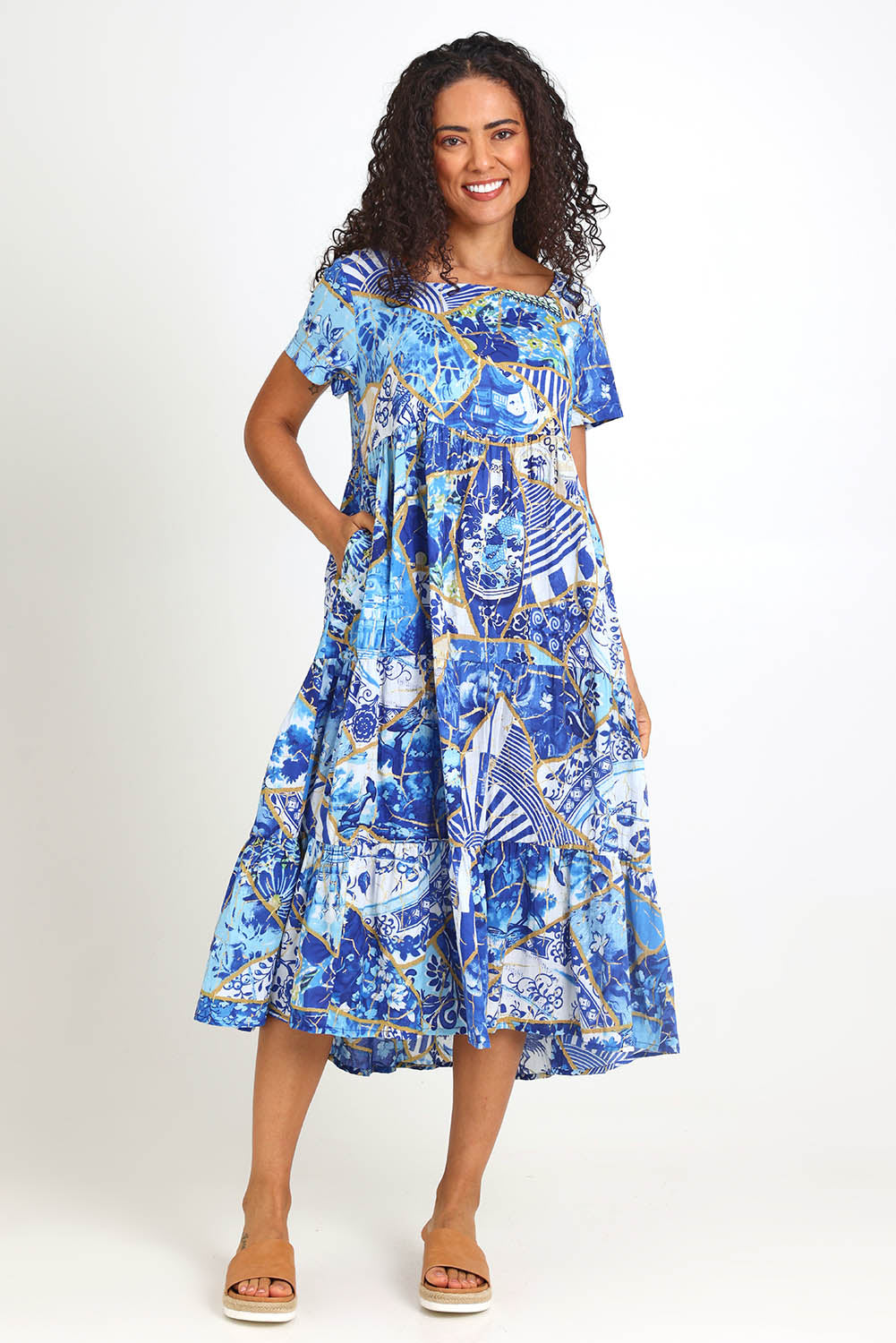 Model Pamelar wearing size 10 of the Square Neckline  Midi Dress – Print in colour Print, from the front