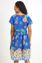 Model Pamelar wearing size 10 of the Boxy Dress – Print in colour Print, from the back