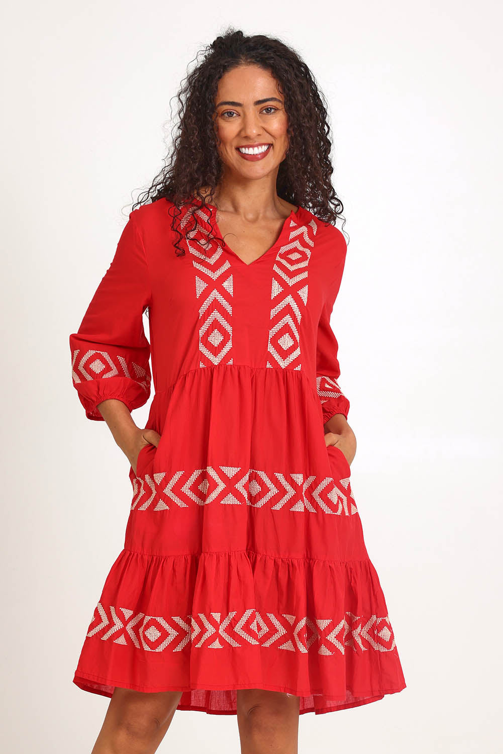 Model Pamelar wearing size 10 of the Essentials Embroidered Layers Cotton Dress - Red in colour Red, in a cropped view