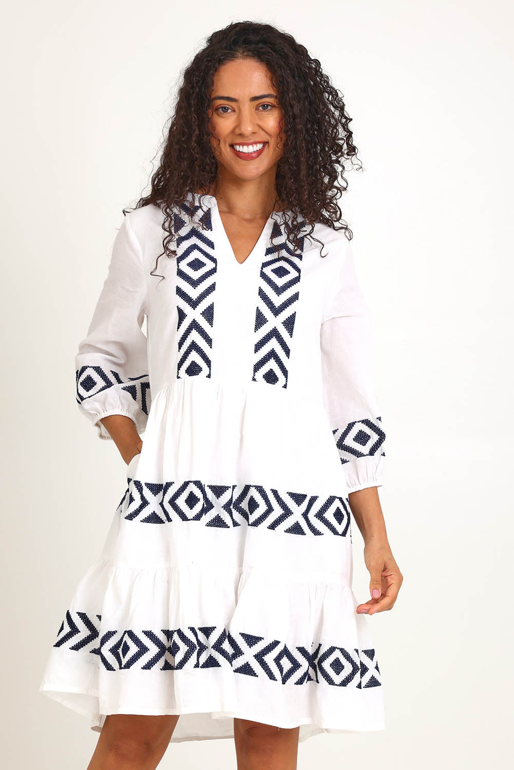 Model Pamelar wearing size 10 of the Essentials Embroidered Layers Cotton Dress - White in colour White, in a cropped view