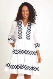 Model Pamelar wearing size 10 of the Essentials Embroidered Layers Cotton Dress - White in colour White, in a cropped view