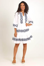 Model Pamelar wearing size 10 of the Essentials Embroidered Layers Cotton Dress - White in colour White, from the front