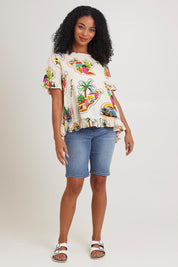 Model Ziara wearing size 10 of the Frill Top in colour Guatemala, from the front, showing the whole outfit