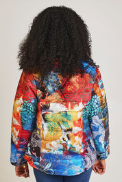 Model Ziara wearing size 10 of the Oriental Nights Puffer Reversible Coat in colour Oriental, from the back