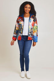Model Ziara wearing size 10 of the Oriental Nights Puffer Reversible Coat in colour Oriental, from the front, showing the whole outfit