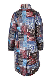 Product shot of the Kantha Reversible Patch Puffer Coat in colour Kantha (Blue), from the back