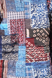 Product shot of the Kantha Reversible Patch Puffer Coat in colour Kantha (Blue), detail