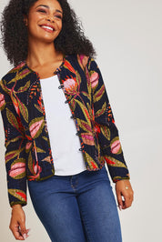 Model Ziara wearing size 10 of the Reckless Reversible Jacket in colour Reckless (Green), from the front, cropped image