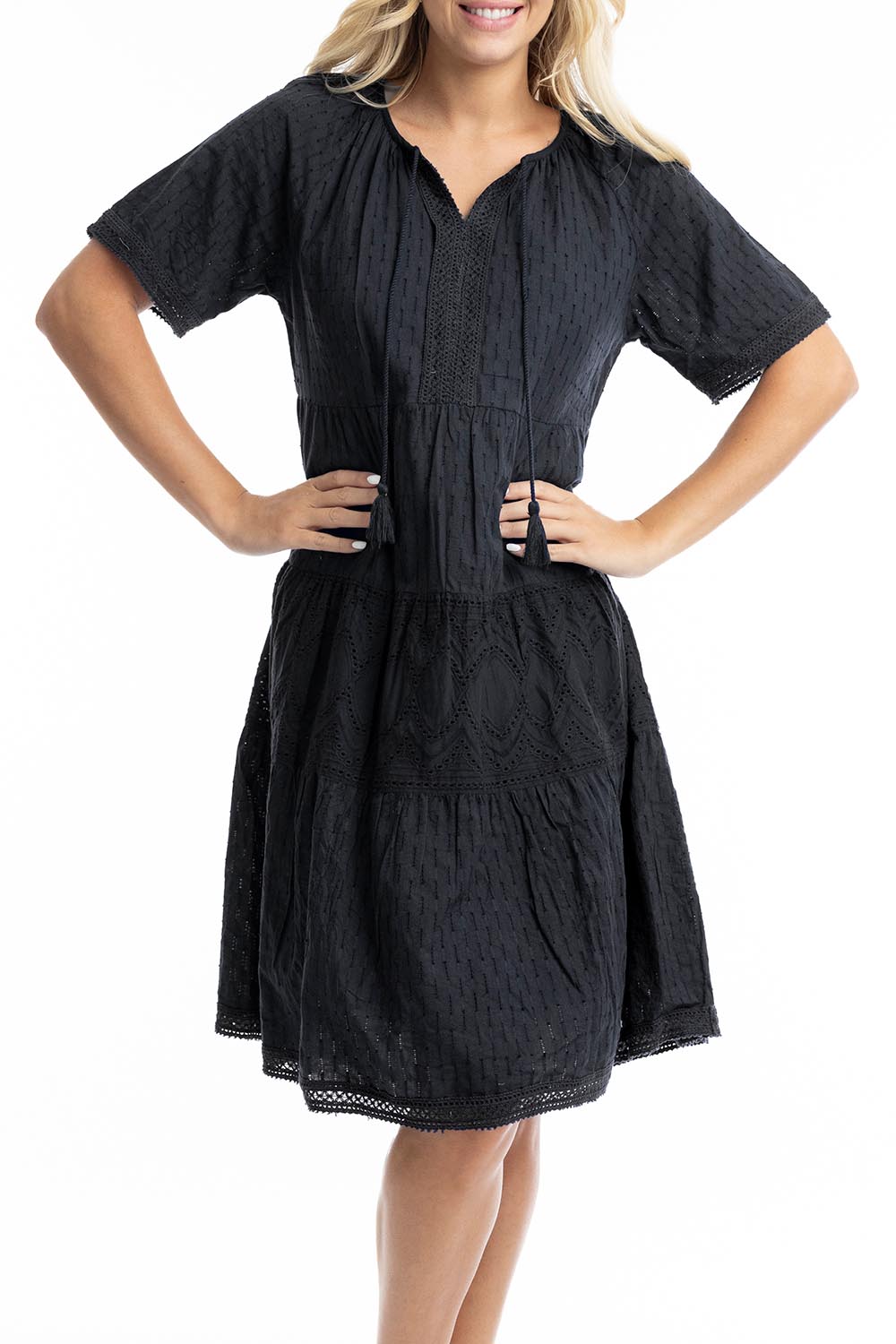 A model wearing the Essential Broderie Layers Cotton Dress in colour Black (Black), from the front, cropped image