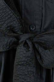 Product shot of the Essentials Organic Cotton Poplin Button through Belt dress in colour Black (Black), detail