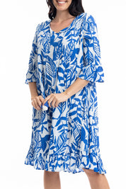 A model wearing the Hayman Cotton Blend Pinch Pleat Frill Sleeve Dress in colour Blue (Blue), from the front, cropped image