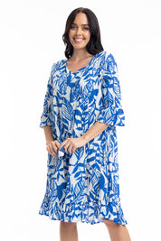 A model wearing the Hayman Cotton Blend Pinch Pleat Frill Sleeve Dress in colour Blue (Blue), from the front, cropped image