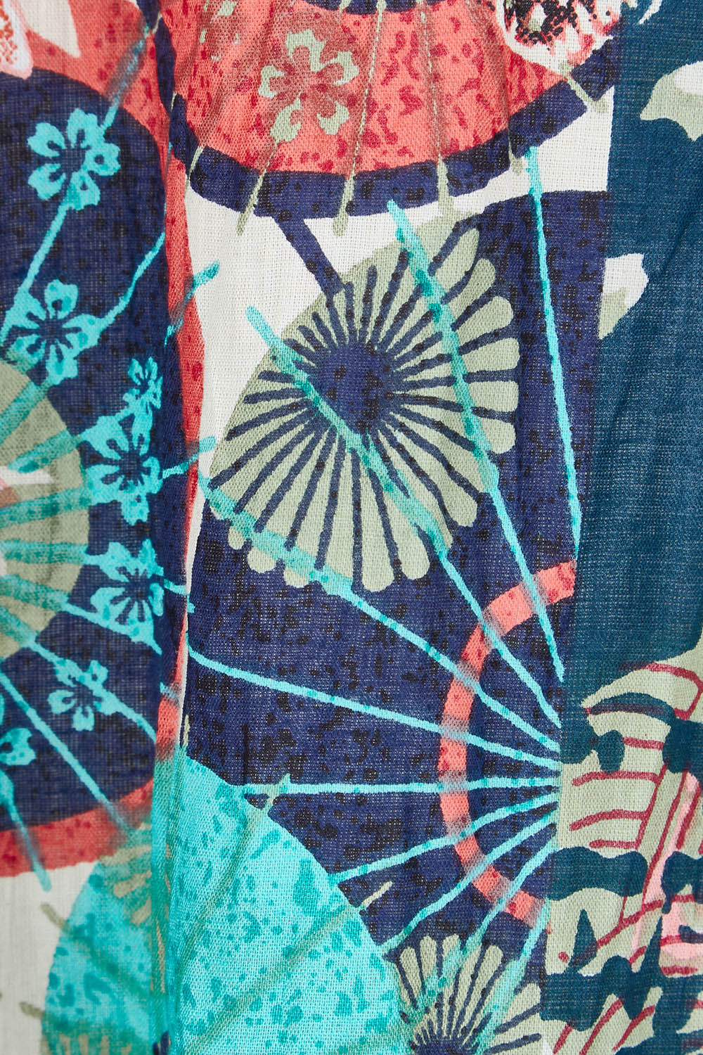 Product shot of the Yakushima Organic Cotton Patch Dress in colour Print (Blue), detail