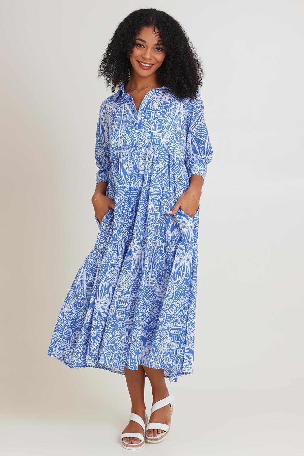 Model Ziara wearing size 10 of the Collar Cotton Midi Dress in colour Blue (Blue), from the front, showing the whole outfit