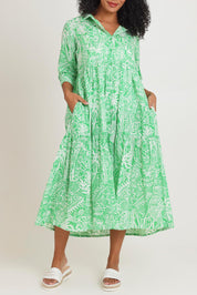 Model Kate wearing size 10 of the Collar Cotton Midi Dress in colour Green (Green), from the front, cropped image