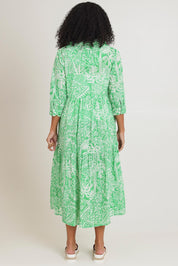 Model Ziara wearing size 10 of the Collar Cotton Midi Dress in colour Green (Green), from the back