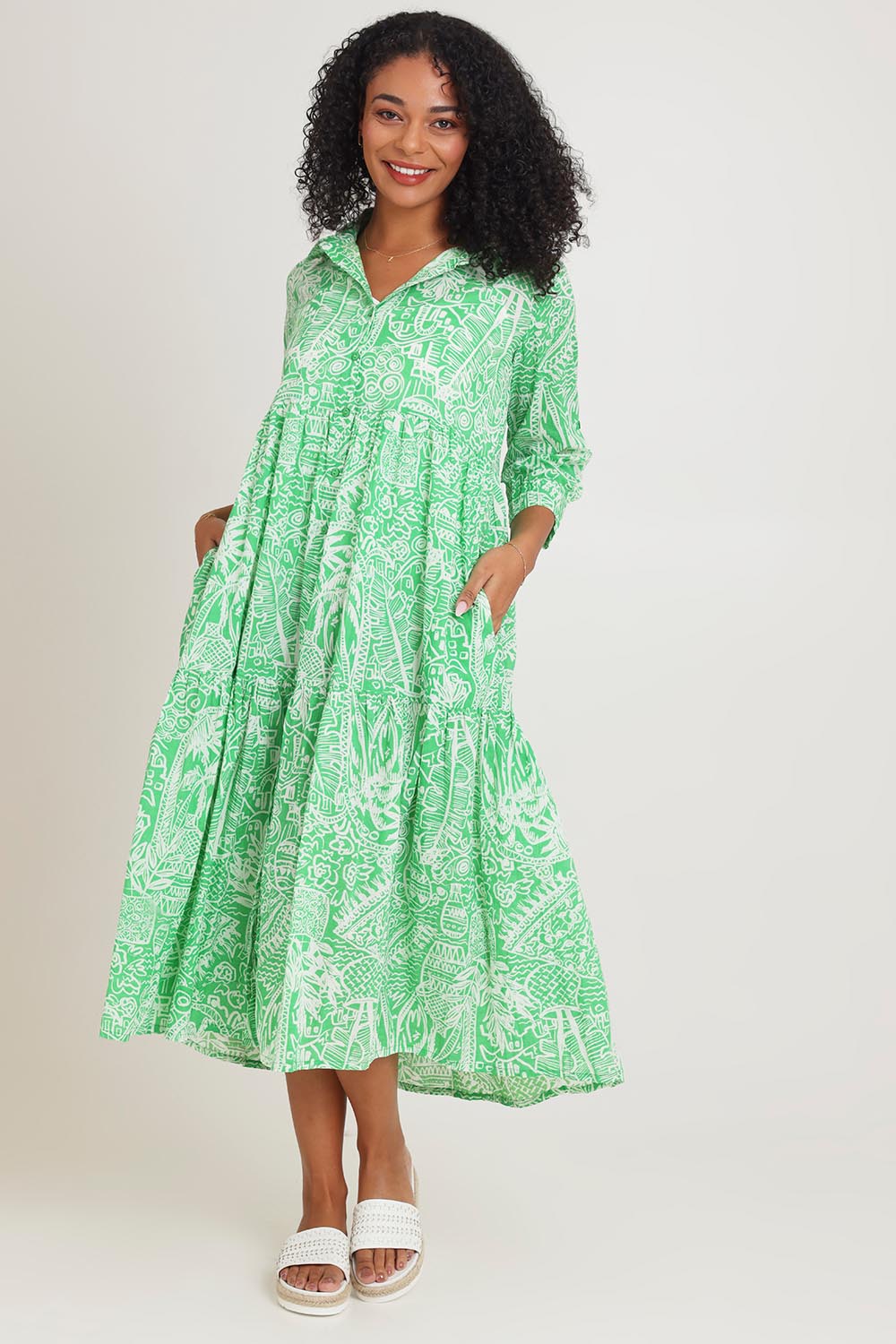 Model Ziara wearing size 10 of the Collar Cotton Midi Dress in colour Green (Green), from the front, showing the whole outfit