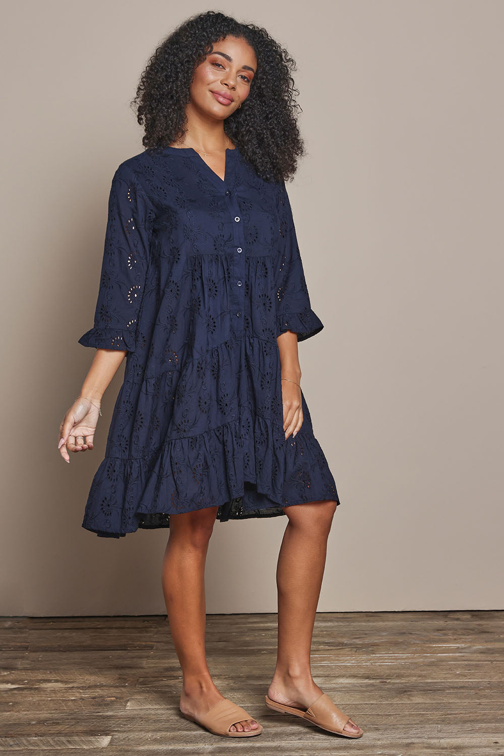 Model Ziara wearing size 10 of the Essentials Frill Hem Broderie Cotton Dress in colour Navy (Blue), from the front, showing the whole outfit