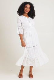 Model Ziara wearing size 10 of the Essentials Maxi Broderie Cotton Dress in colour White (White), from the front, showing the whole outfit