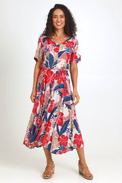 Model Pamelar wearing size 10 of the Godet Dress – Print in colour Print, from the front