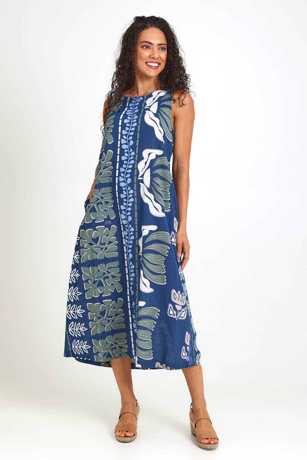 Model Pamelar wearing size 10 of the Sleeveless Midi Dress – Blue in colour Blue, from the front