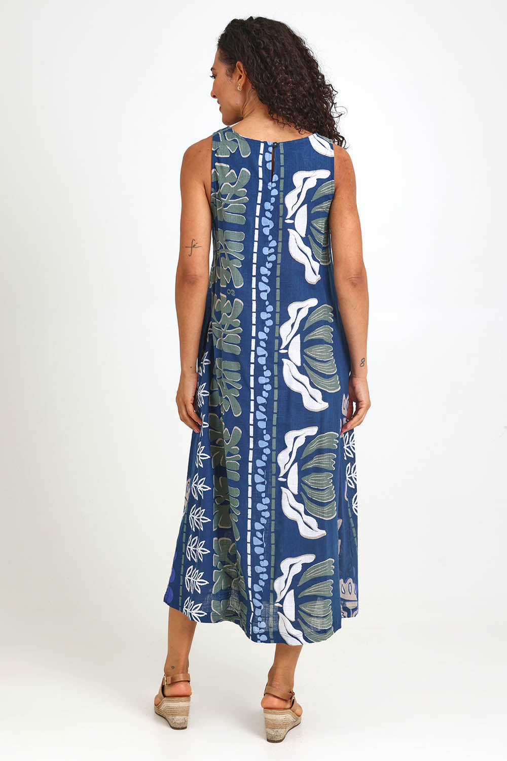 Model Pamelar wearing size 10 of the Sleeveless Midi Dress – Blue in colour Blue, from the front