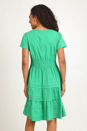 Model Pamelar wearing size 10 of the Essentials Poplin Short Sleeve Cotton Short Dress - Green in colour Green, from the front