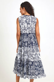 Model Pamelar wearing size 10 of the Sleeveless Layers Dress – Mix in colour Mix, from an angle