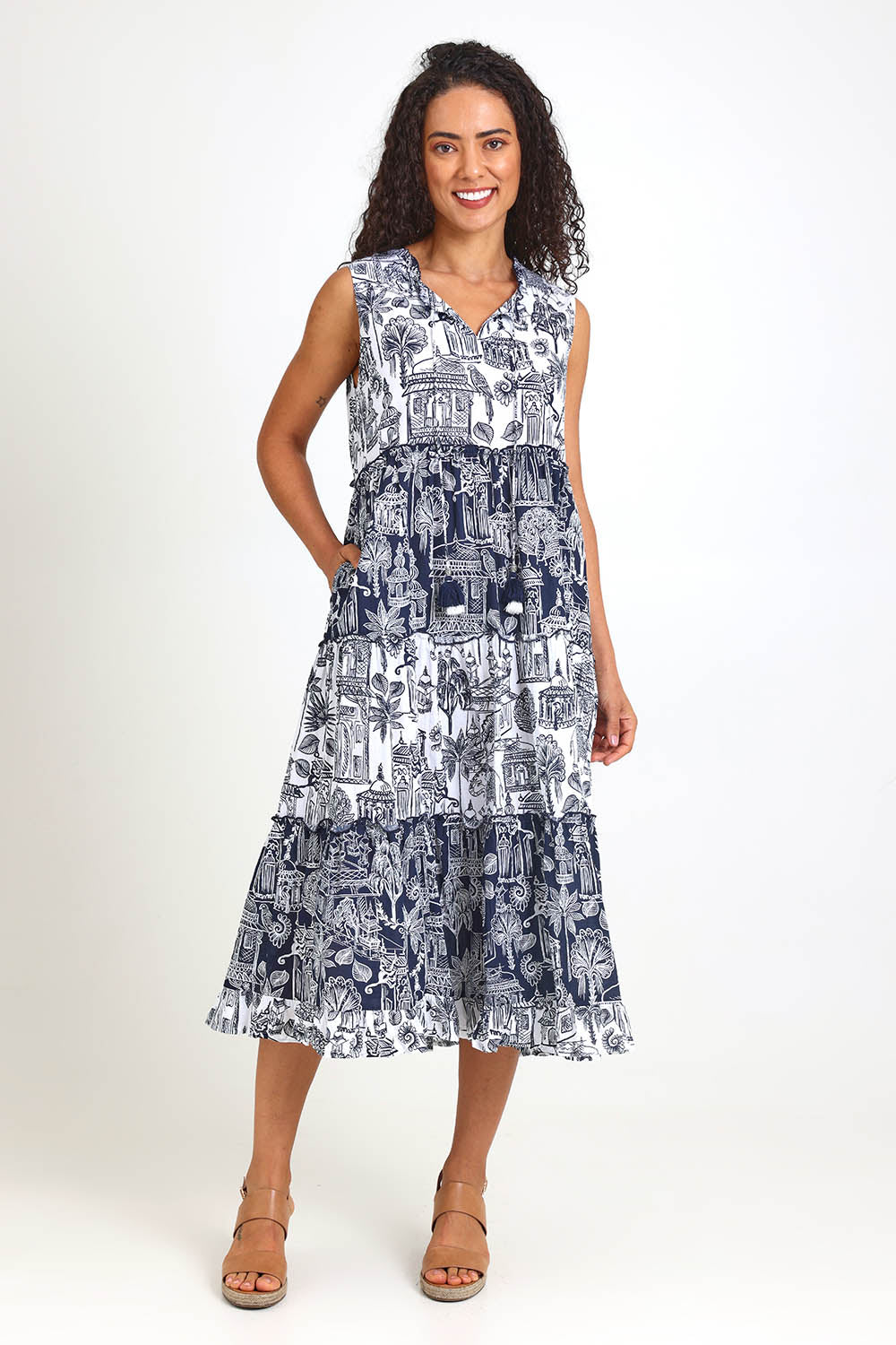 Model Pamelar wearing size 10 of the Sleeveless Layers Dress – Mix in colour Mix, from the front