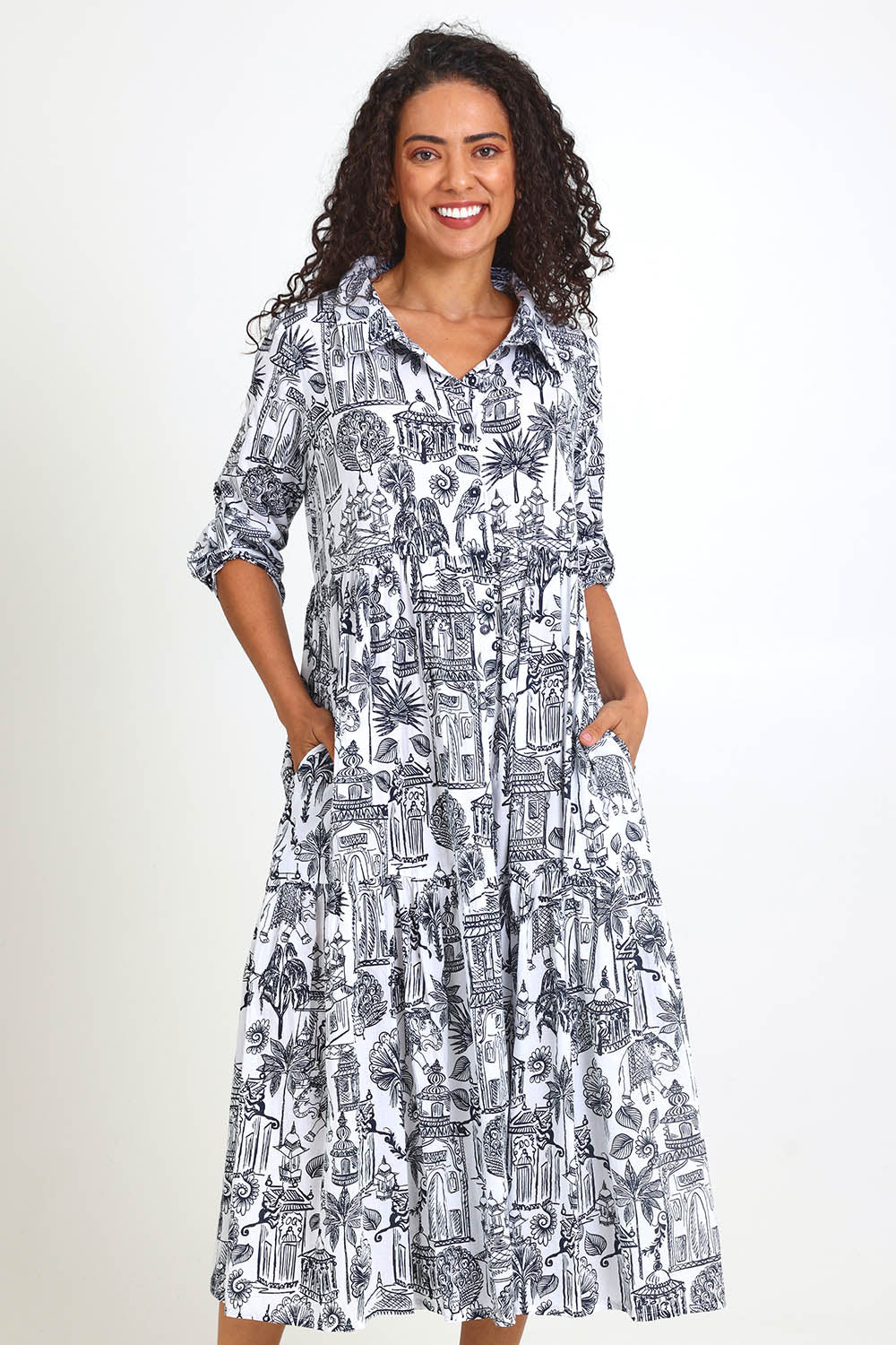 Model Pamelar wearing size 10 of the Layers Collar Dress – White in colour White, from the front