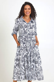 Model Pamelar wearing size 10 of the Layers Collar Dress – White in colour White, from the front