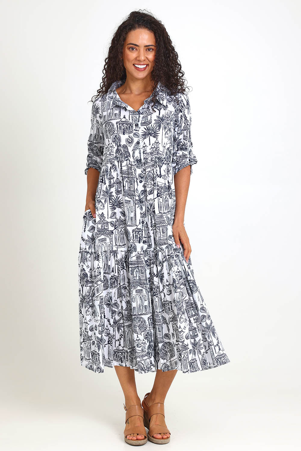 Model Pamelar wearing size 10 of the Layers Collar Dress – White in colour White, from the front
