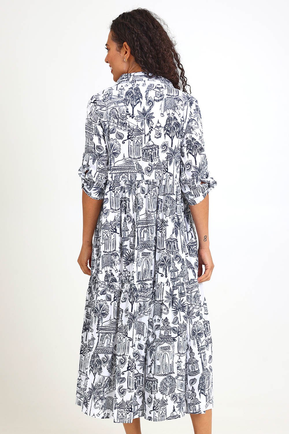 Model Pamelar wearing size 10 of the Layers Collar Dress – White in colour White, from the front