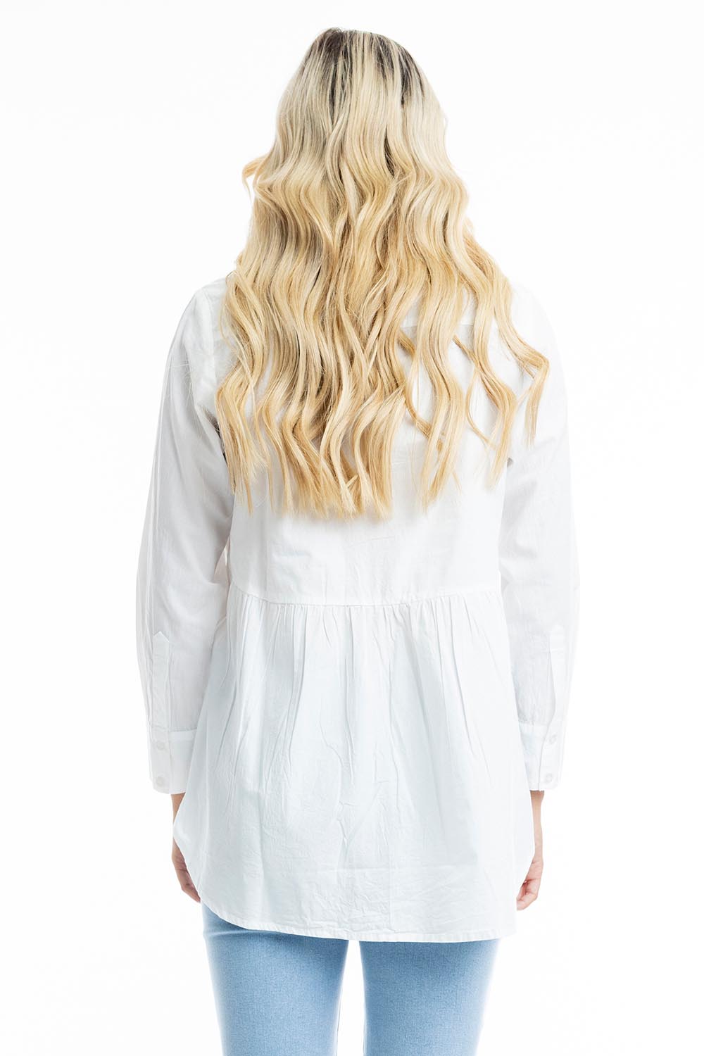 A model wearing the Essentials Organic Cotton Poplin Ruched Shirt in colour White (White), from the back