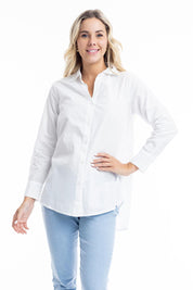 A model wearing the Essentials Organic Cotton Poplin Ruched Shirt in colour White (White), from the front, cropped image