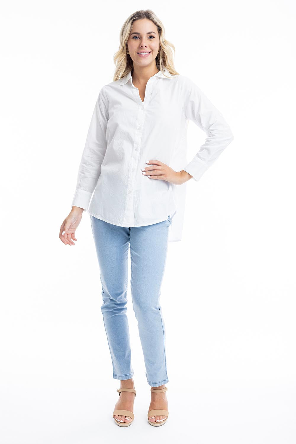 A model wearing the Essentials Organic Cotton Poplin Ruched Shirt in colour White (White), from the front, showing the whole outfit