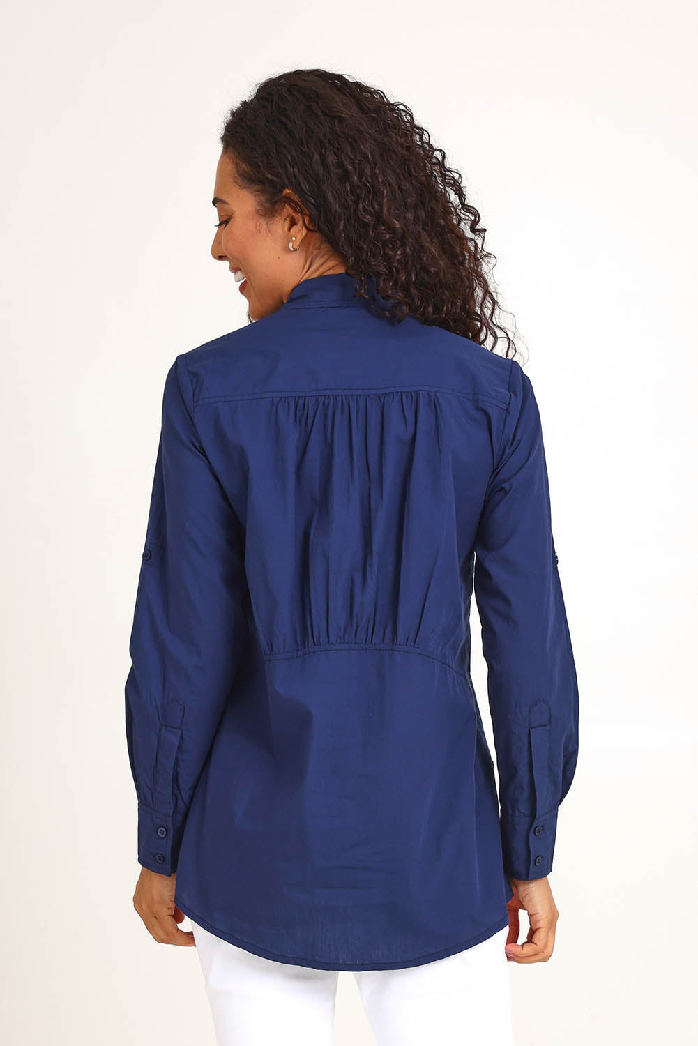 Model Pamelar wearing size 10 of the Essentials Poplin Cotton Shirt - Navy in colour Navy, from an angle