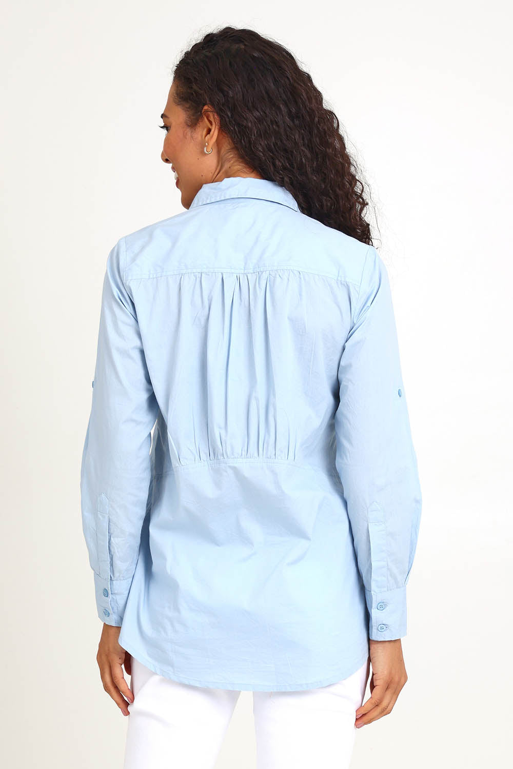Model Pamelar wearing size 10 of the Essentials Poplin Cotton Shirt - Sky in colour Sky, from the back